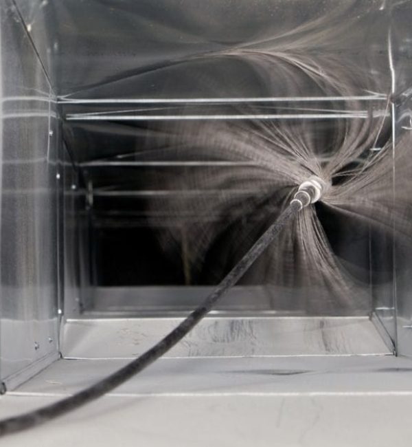 Air duct interior with cleaning hose