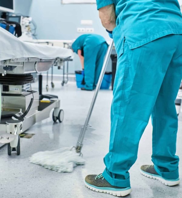 woman-cleaning-staff-mopping-the-floor-of-a-hospital-operating-room.jpg